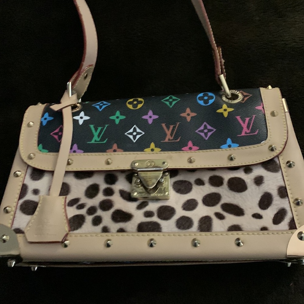 Luis Vuitton multi color bag with strap.